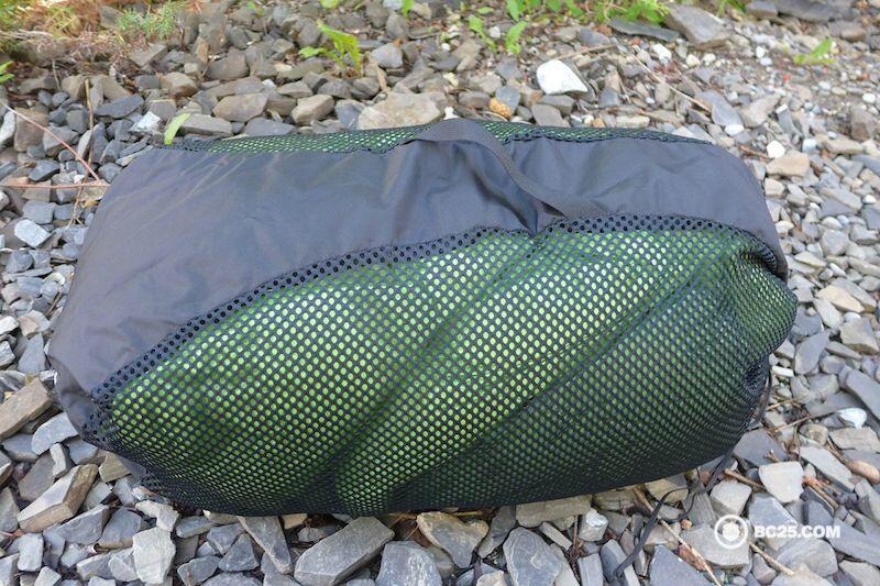 A Mountain Hardwear sleeping bag in it's mesh storage sack giving it plenty of room to expand.