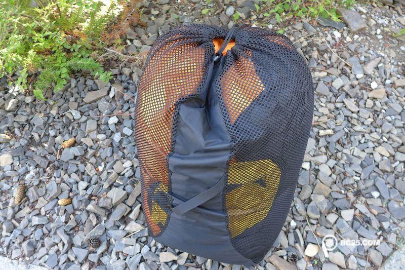A super fluffy, -30 down winter sleeping bag from Mountain Hardwear in it's mesh storage sack.
